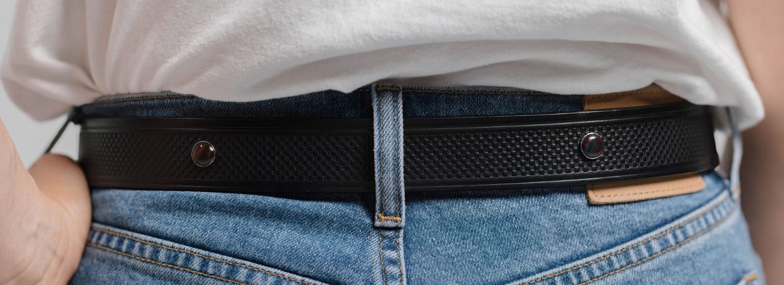 Woman wearing black Zodiac belt
